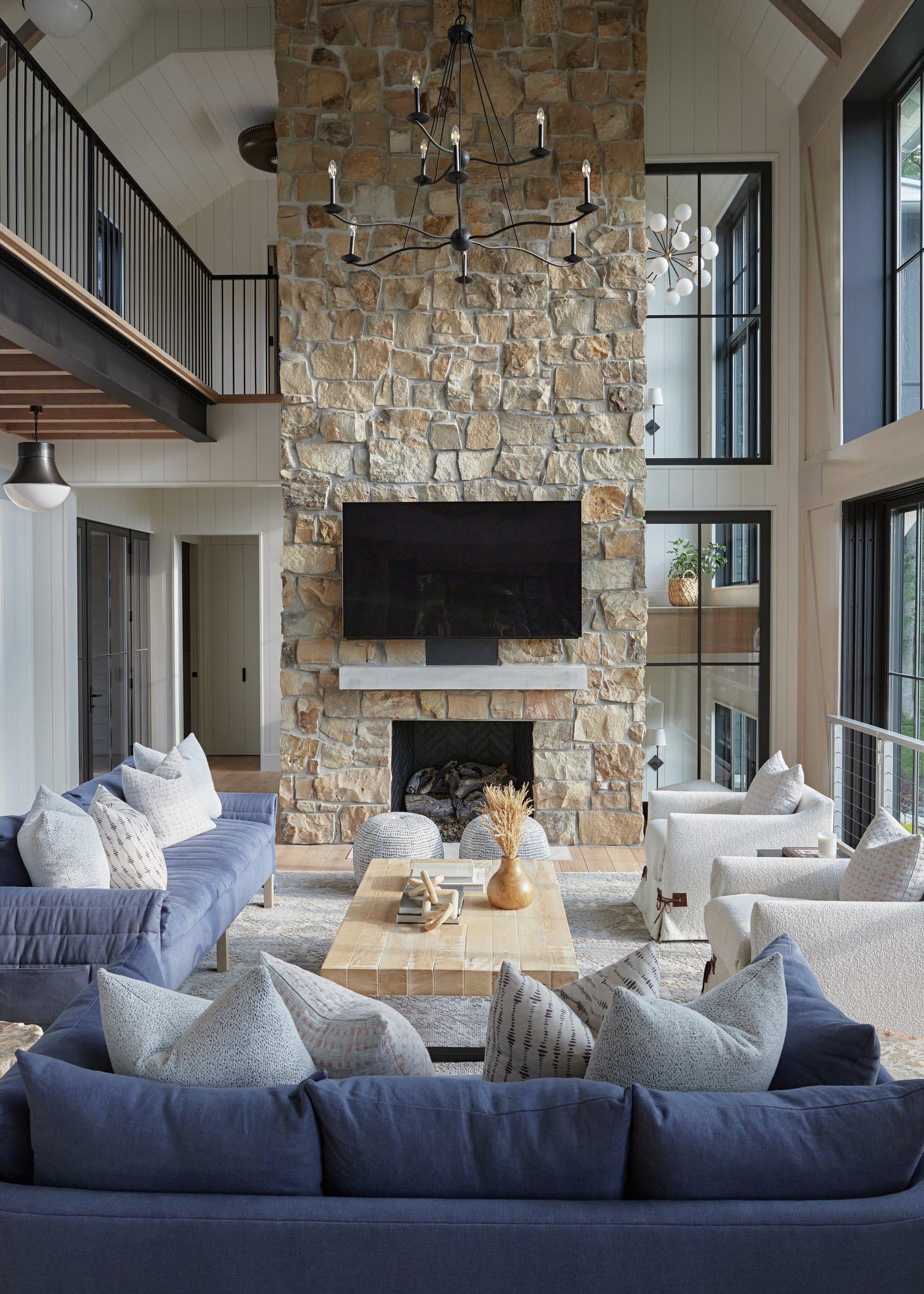 Coastal Living Room with a Stone Fireplace